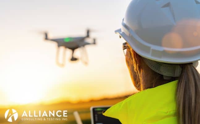 woman conducting drone roof inspection